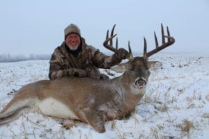 John Meyer with an Alberta Whitetail with Legend Outfitting