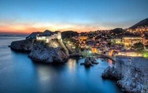 Mediterranean balmy days by sapphire waters in the shade of ancient walled towns.