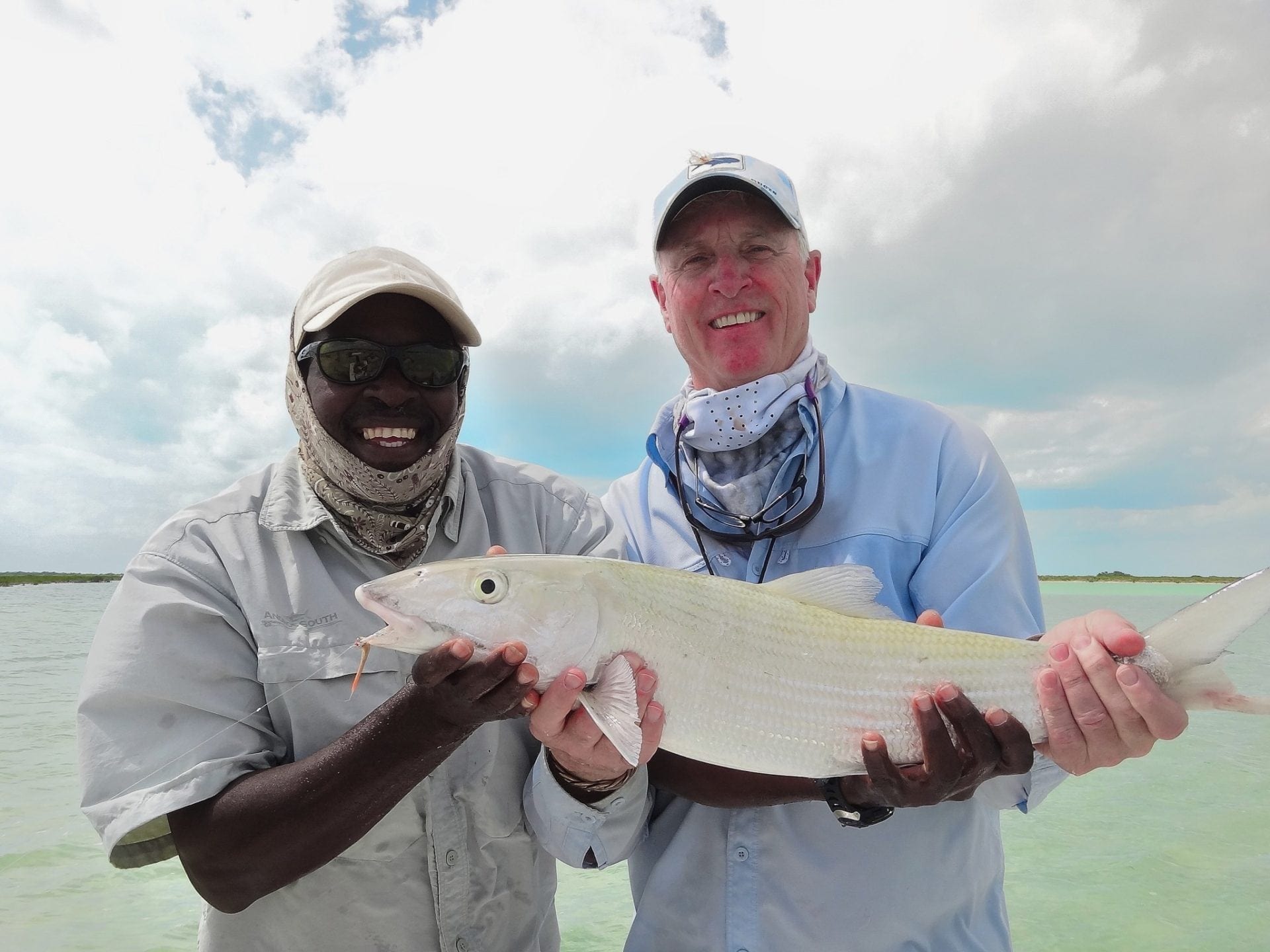 Norman and Ralph with a big bonefish. Bahamas fishing at it's best.