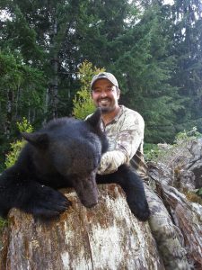Cory Glauner with his Washington black bear