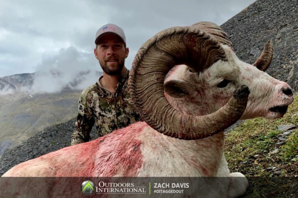 OUTDOORS INTERNATIONAL hunter Zach Davis with a beautiful Alaska ram.