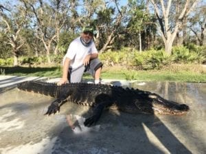 happer hunter with his big old gator