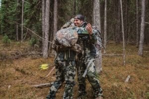 Successful hunters hugging