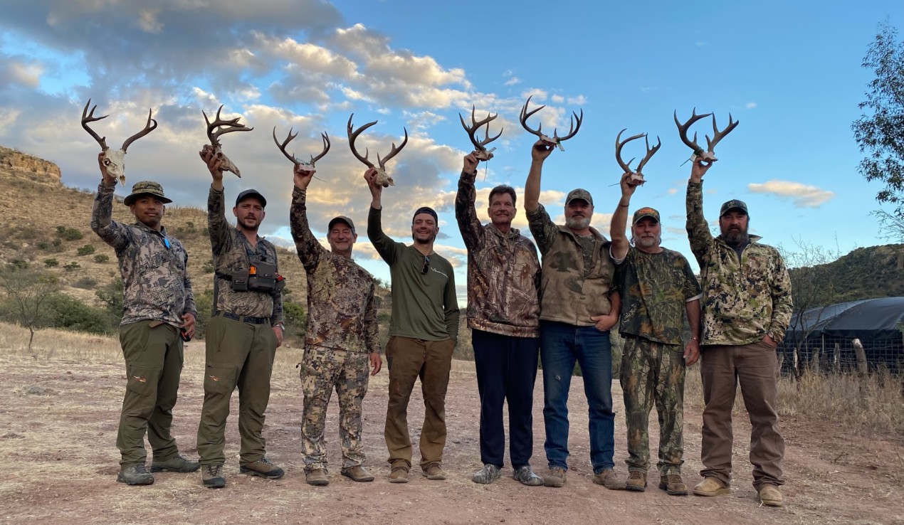 A group of happy Coues deer hunters.